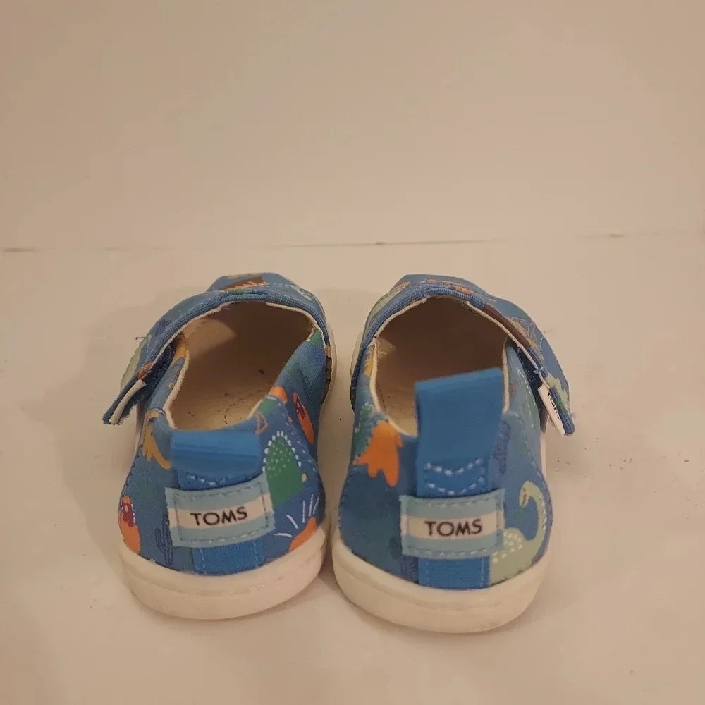 TOMS Dinoland Baby/Toddler Glow-In-The-Dark Alpargata Shoes in Size T6 Toddler